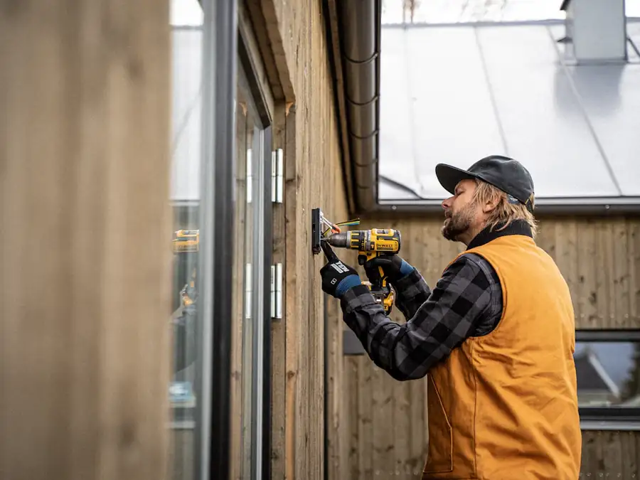 Electrician installing an outlet